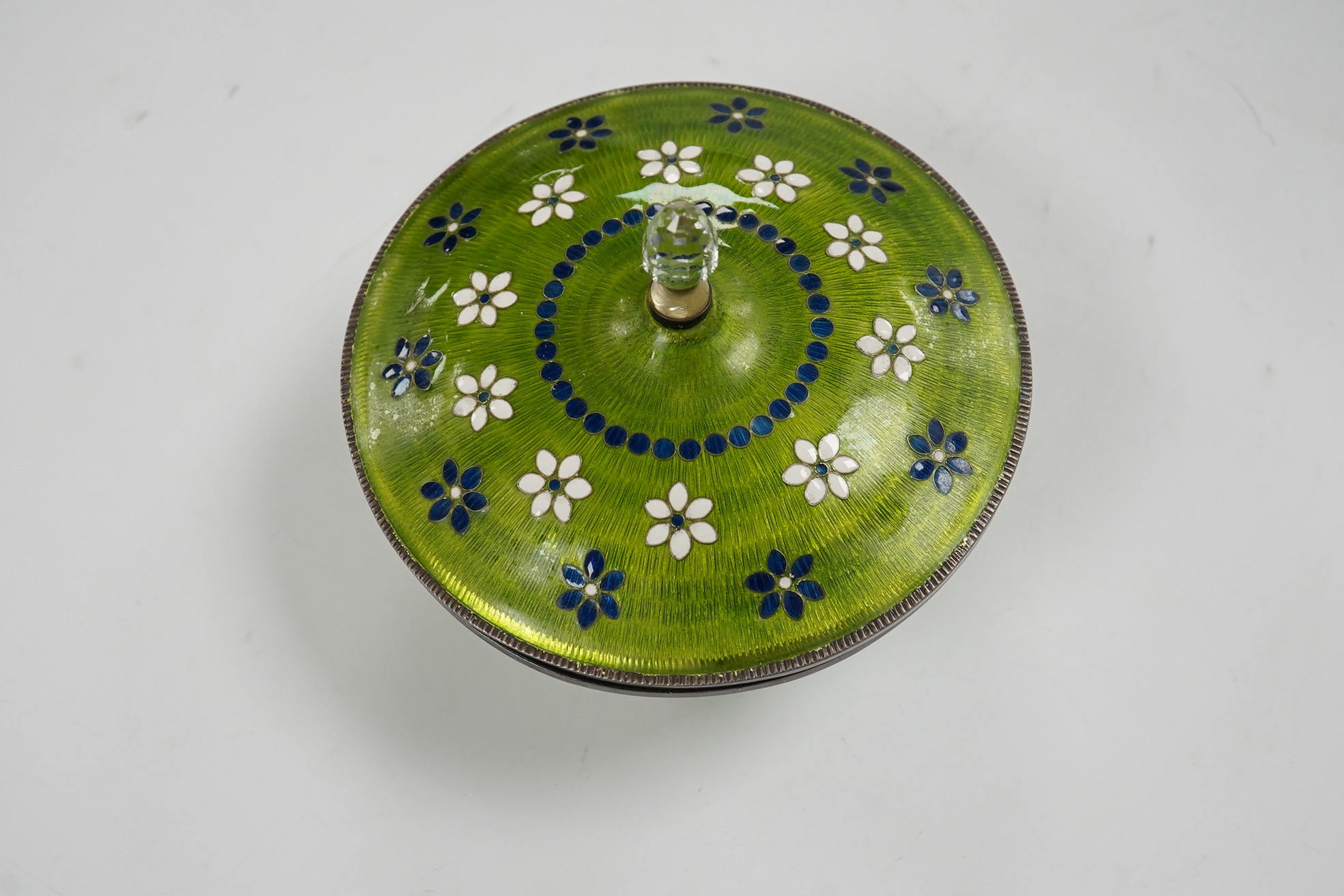 A Korean white metal and enamelled circular pot and cover, diameter 11cm, gross weight 7.6oz. Condition - fair to good